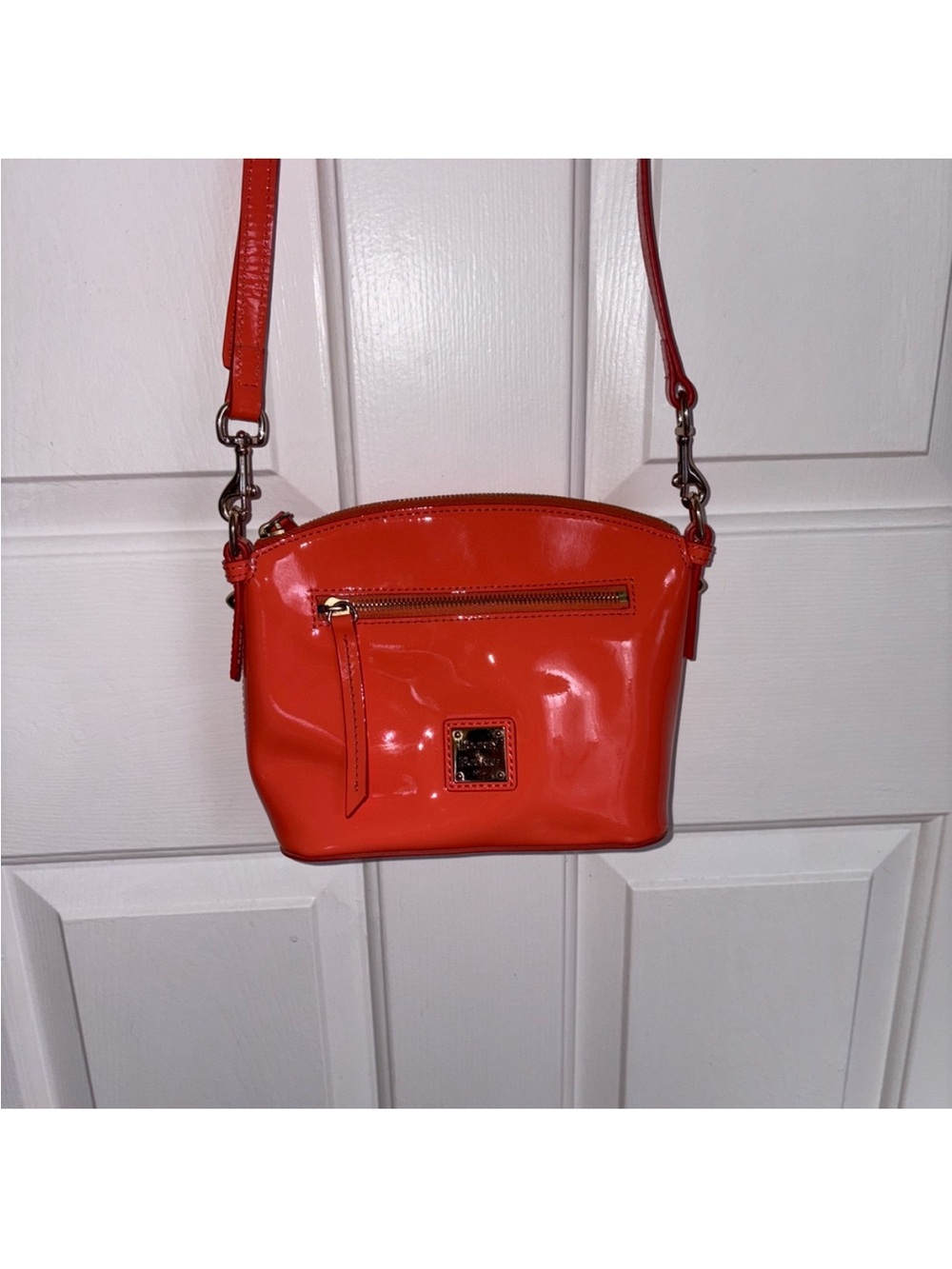 Dooney & Bourke Orange Patent Leather Domed Crossbody Purse